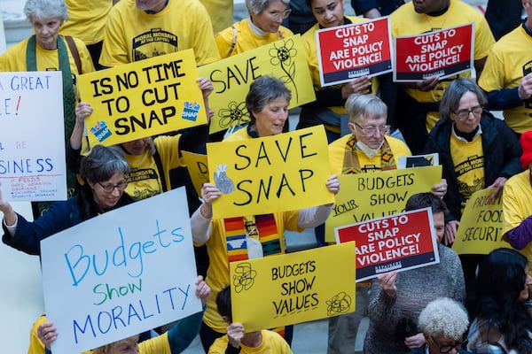 Demonstrators rallied for the Supplemental Food Assistance Program, or SNAP, at the Capitol in Atlanta on Monday. (Arvin Temkar/AJC)