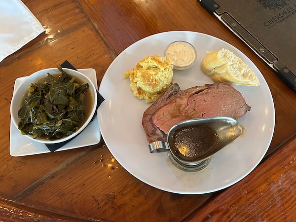 At Cherokee Rose in Stone Mountain, a dinner of smoked prime rib, jalapeno corn pudding, and collard greens. RFK Jr. had the same meal on his visit to the restaurant, with a larger piece of prime rib. (Thomas Lake/AJC)