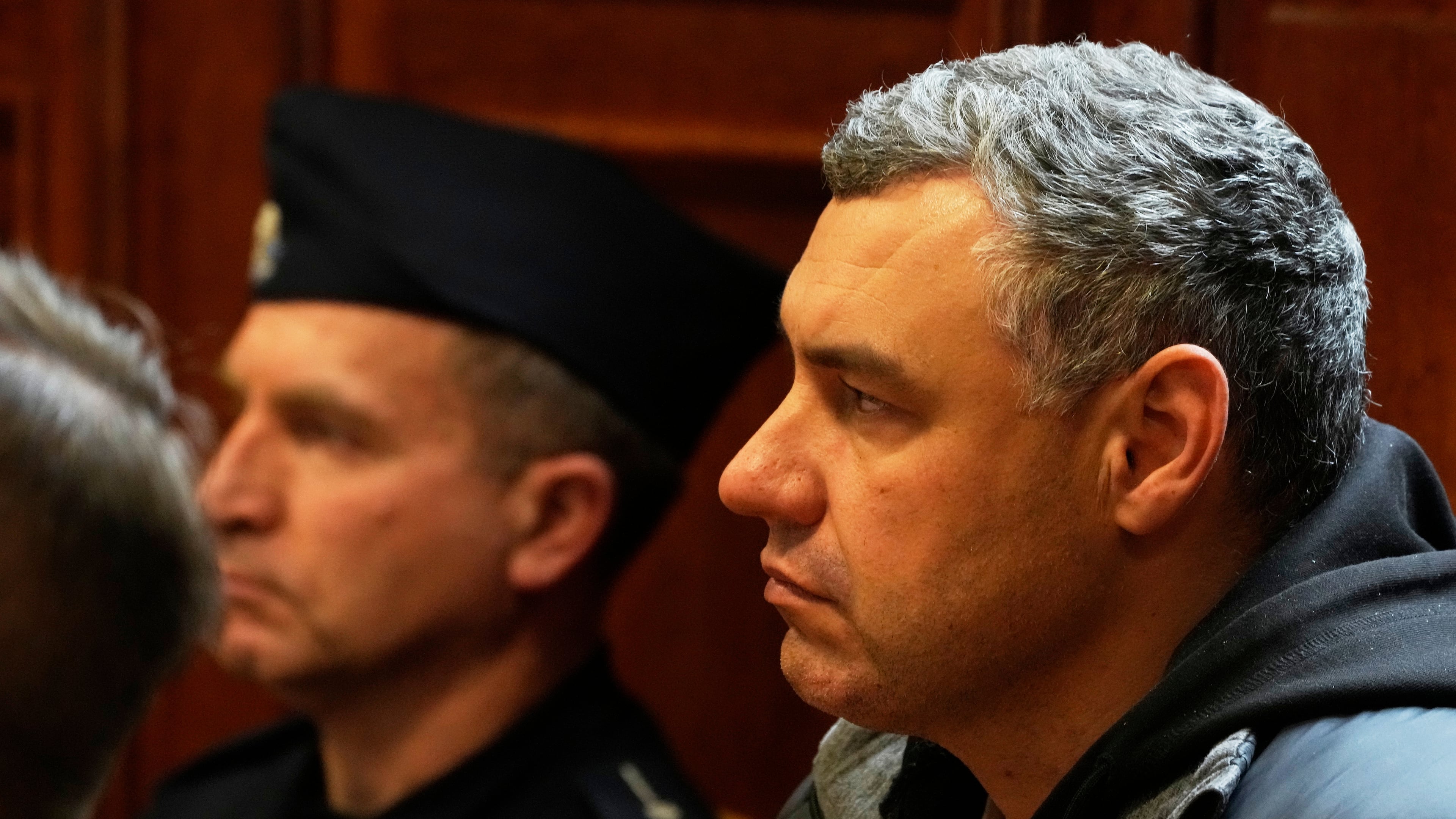 Ukrainian defendant Volodymyr Zuravlov listens as a judge announces the decision not to allow for extradition to Germany in courtroom of Warsaw's Regional Court in Warsaw, Poland, Friday, Oct. 17, 2025. (AP Photo/Czarek Sokolowski)