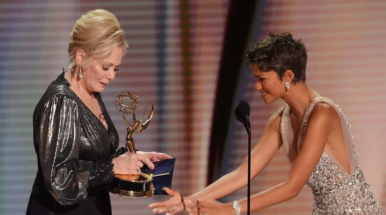 Zendaya, right, presents the award for outstanding lead actress in comedy series to Jean Smart, left, for "Hacks" during the 78th Emmy Awards on Monday, Sept. 14, 2026, at the Peacock Theater in Los Angeles. (AP Photo/Chris Pizzello)