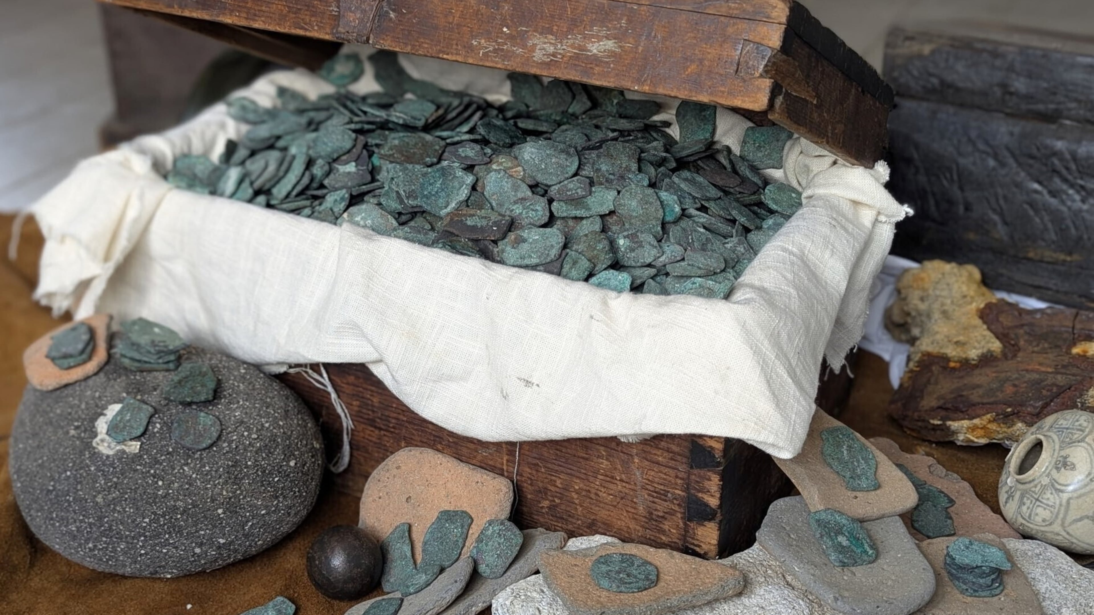This photo provided by shipwreck salvage company 1715 Fleet - Queens Jewels, LLC shows Spanish coins the firm uncovered from a shipwreck off the Atlantic coast of Florida, 2025. (1715 Fleet - Queens Jewels, LLC via AP)