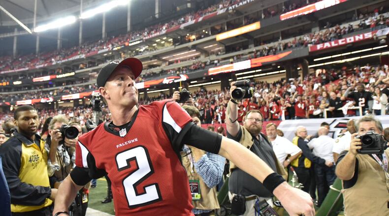 January 14, 2017 Atlanta - Atlanta Falcons quarterback Matt Ryan (2) celebrates after Atlanta Falcons won 36-20 during the NFC divisional playoffs at the Georgia Dome on Saturday, January 14, 2017. HYOSUB SHIN / HSHIN@AJC.COM
