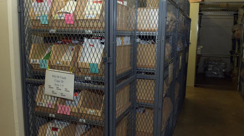 Rape kits are shown in the secure vault at the Georgia Bureau of Investigation. KENT D. JOHNSON/KDJOHNSON@AJC.COM