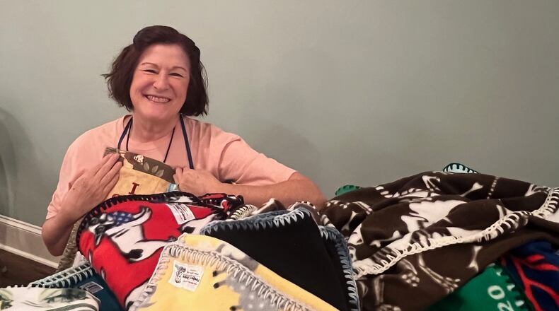Christine Newby runs the Augusta chapter of Project Linus, a non-profit organization that creates and distributes blankets to kids in need. (Courtesy of Charmain Brackett/Augusta Good News)