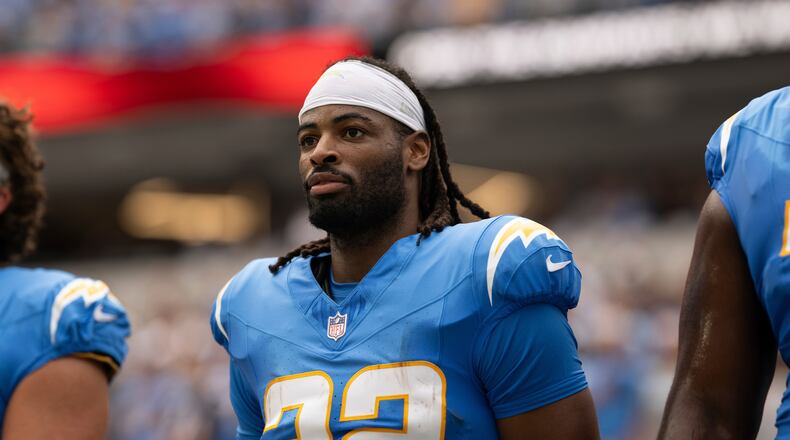 FILE - Los Angeles Chargers running back Najee Harris (22) stands for the National Anthem before an NFL football game against the Denver Broncos, Sept. 21, 2025, in Inglewood, Calif. (AP Photo/Kyusung Gong, File)
