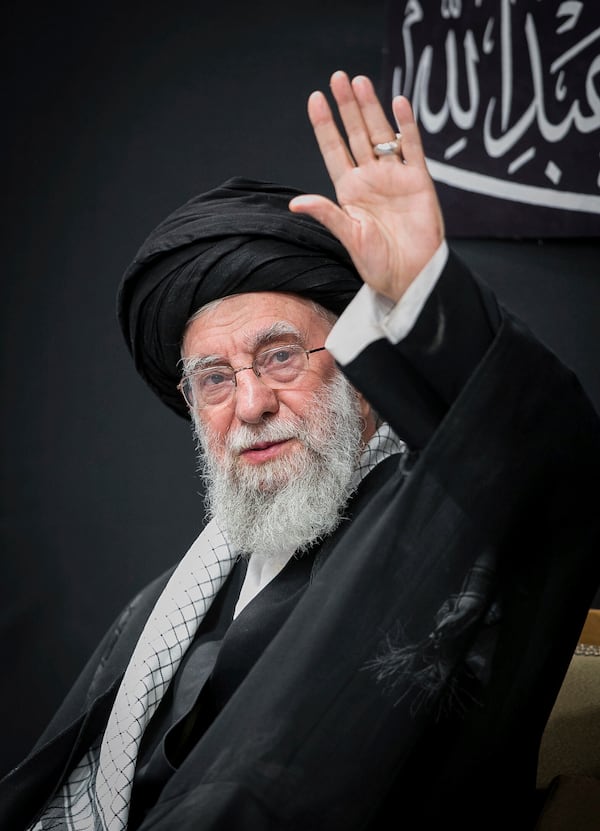 In this photo provided by the Office of the Iranian Supreme Leader, Supreme Leader Ayatollah Ali Khamenei attends a mourning ceremony commemorating the death anniversary of the Prophet Muhammad's grandson, Hussein, in Tehran, Iran, on Saturday, July 6, 2025. (Office of the Iranian Supreme Leader via AP)