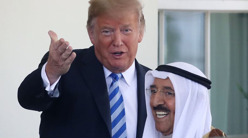 President Donald Trump welcomes the Emir of Kuwait, SheikhJaber Al-Ahmad Al-Sabah, upon his arrival for a meeting at the White House, on September 5, 2018 in Washington, DC. (Photo by Mark Wilson/Getty Images)