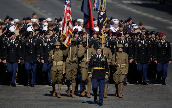 FILE - U.S troops march down the Champs Elysees during the Bastille Day parade in Paris, July 14, 2017. (AP/Photo/Markus Schreiber, File)
