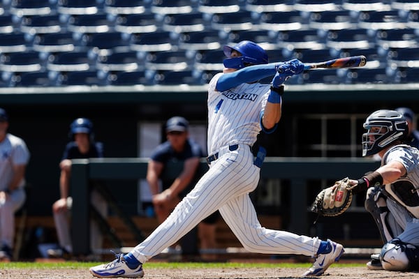 Creighton's Teddy Deters (4) connects during the eighth inning of an NCAA college baseball game against Xavier, Sunday, May 11, 2025, in Omaha, Neb. (Nikos Frazier/Omaha World-Herald via AP)