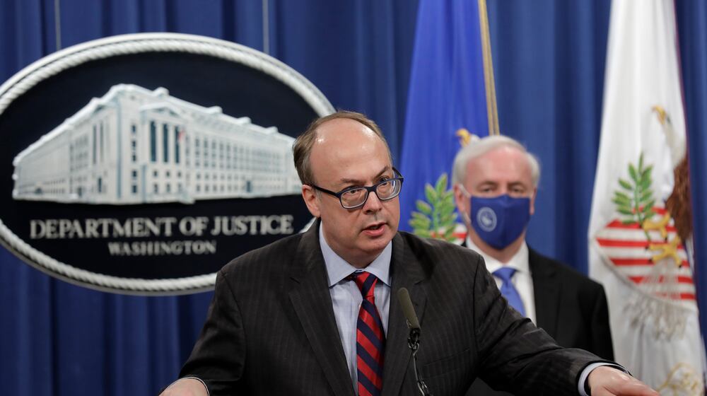 Acting Assistant U.S. Attorney General Jeffrey Clark speaks next to Deputy U.S. Attorney General Jeffrey Rosen at a news conference at the Justice Department in Washington, D.C., on Oct. 21, 2020. (Yuri Gripas/POOL/AFP/Getty Images/TNS)