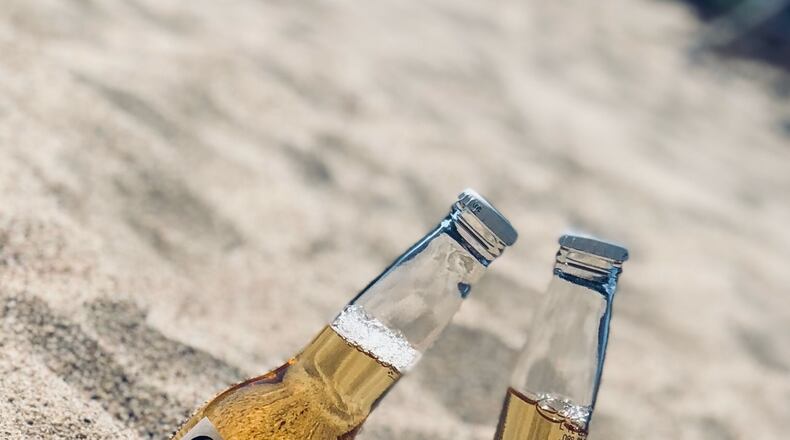 Georgia’s largest public beach could decide in early 2021 whether to ban drinking alcohol outdoors.