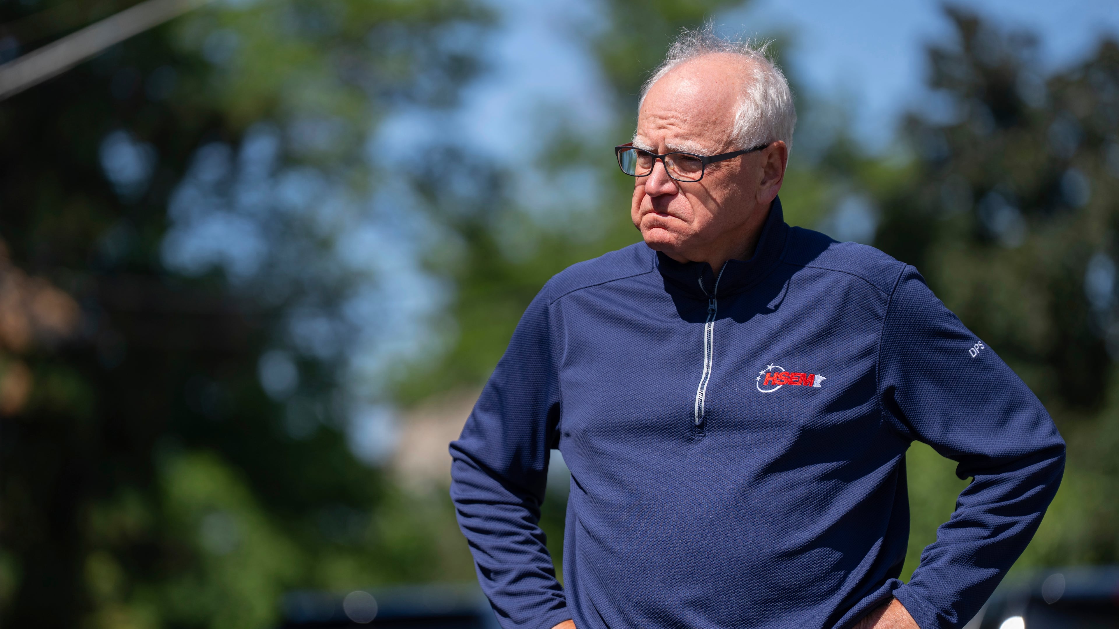 Minnesota Governor Tim Walz waits for a press conference to start outside Annunciation Church after a shooting earlier in Minneapolis, Wednesday, Aug. 27, 2025. (Alex Kormann/Star Tribune via AP)