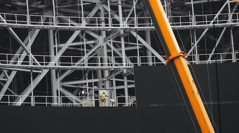 Panels are being assembled that will form the giant halo-shaped video board around the retractable-roof opening inside Mercedes-Benz Stadium. Curtis Compton/ccompton@ajc.com