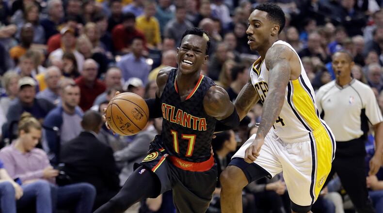 Atlanta Hawks’ Dennis Schroder (17) goes to the basket against Indiana Pacers’ Jeff Teague during the second half of an NBA basketball game Wednesday, Nov. 23, 2016, in Indianapolis. Atlanta defeated Indiana 96-85. (AP Photo/Darron Cummings)