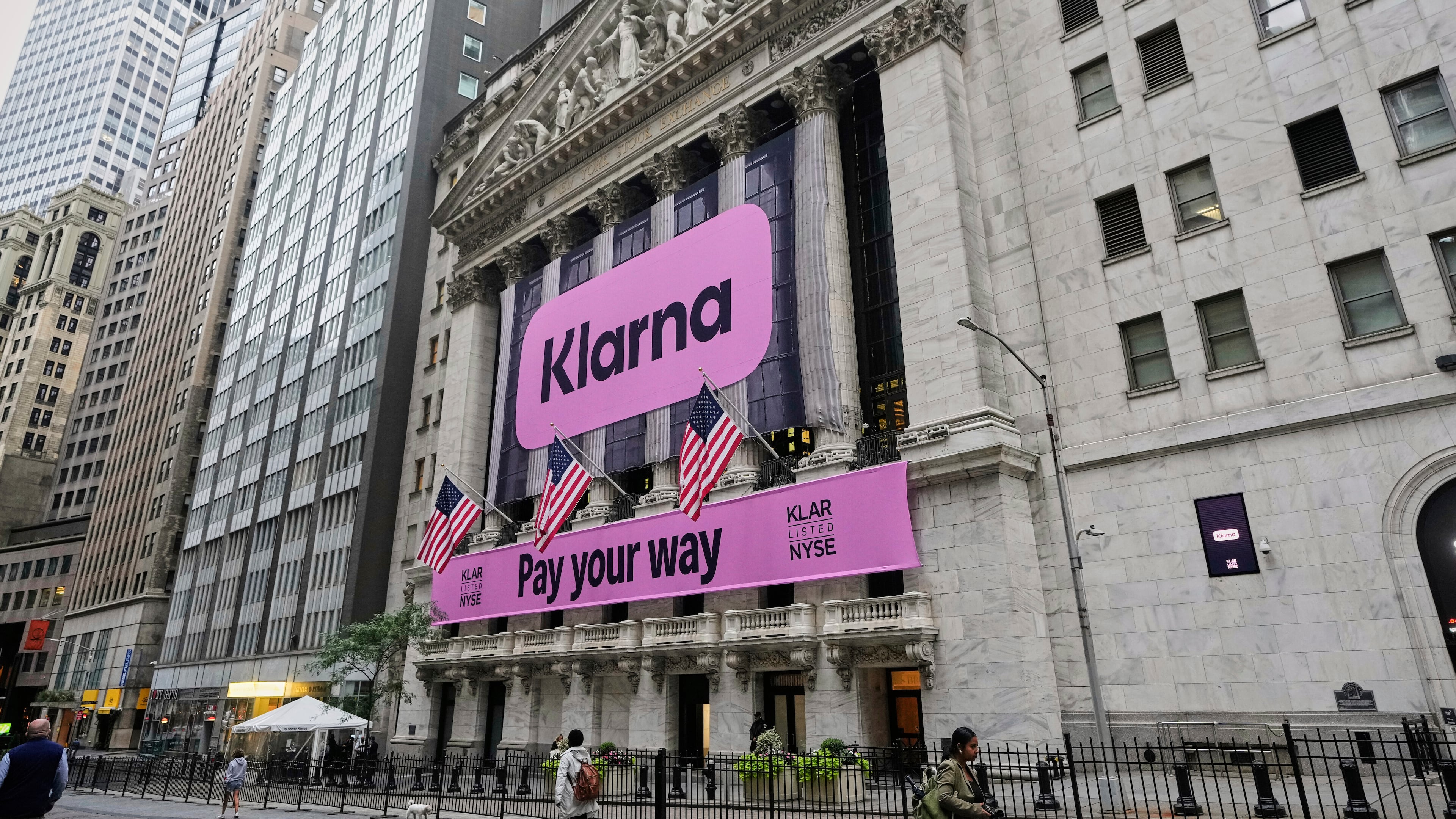FILE - The facade of New York Stock Exchange displays signage for Sweden's Klarna, Sept. 10, 2025. (AP Photo/Richard Drew, File)