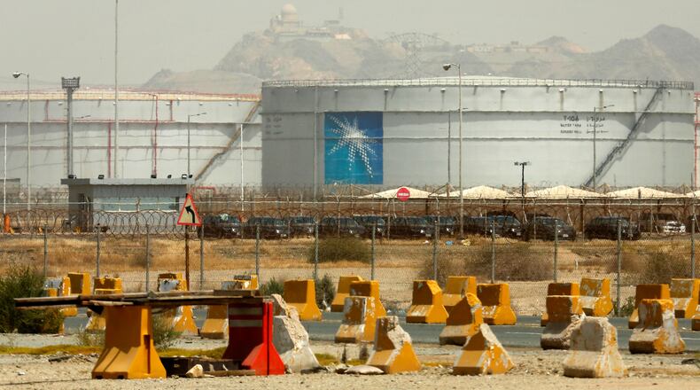 FILE - Storage tanks are seen at the North Jeddah bulk plant, an Aramco oil facility, in Jeddah, Saudi Arabia, on March 21, 2021. (AP Photo/Amr Nabil, File)