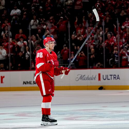 Detroit Red Wings right wing Patrick Kane celebrates after scoring his 500th career goal during the third period of an NHL hockey game against the Vancouver Canucks Thursday, Jan. 8, 2026, in Detroit. (AP Photo/Ryan Sun)