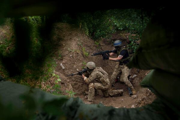 Ukrainian 3rd Assault Brigade recruits train at the polygon in Kyiv region, Ukraine, on Wednesday, July 16, 2025. (AP Photo/Evgeniy Maloletka)
