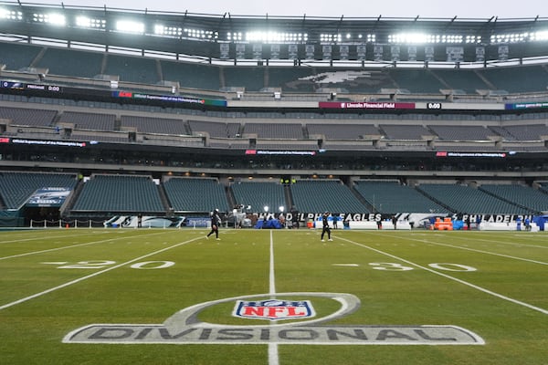 FILE - The logo for the NFL football NFC divisional playoff game between the Philadelphia Eagles and the Los Angeles Rams is visible on the field on Sunday, Jan. 19, 2025, in Philadelphia. (AP Photo/Matt Slocum, file)