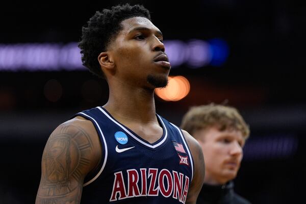 Arizona guard Caleb Love (1) walks off the floor after Arizona lost to Duke in a Sweet 16 round NCAA college basketball tournament game, Friday, March 28, 2025, in Newark, N.J. (AP Photo/Julia Demaree Nikhinson)