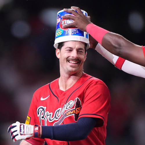Atlanta Braves' Mike Yastrzemski (18) celebrates in the 10th inning of a baseball game against the Boston Red Sox Friday, May 15, 2026, in Atlanta. (AP Photo/Brynn Anderson)