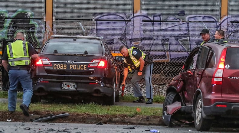 A Cobb County police officer was involved in a crash Thursday morning.