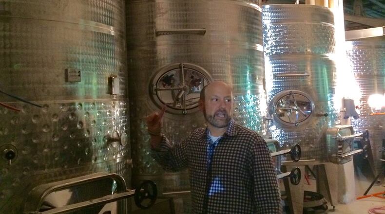 Michael Dorf, founder of City Winery, stands in the lower-level wine production area of the new location at Ponce City Market. CONTRIBUTED PHOTO