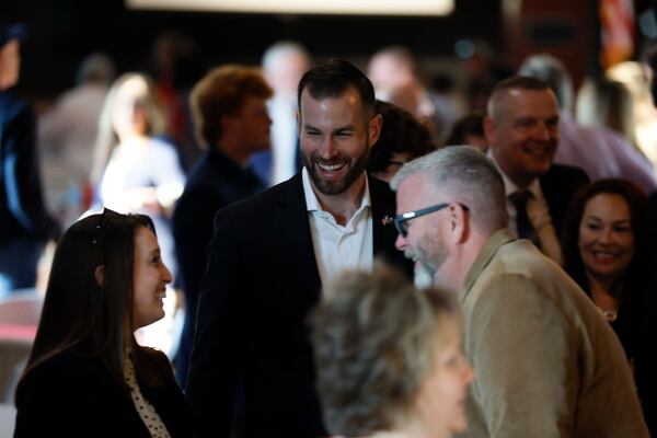 Clay Fuller (center) talks with supporters at his runoff election watch party at the Historic Ringgold Depot on Tuesday, April 7, 2026. Fuller, a Republican aligned with President Donald Trump, defeated Democrat Shawn Harris for Georgia’s 14th Congressional District to replace Marjorie Taylor Greene. (Miguel Martinez/AJC)