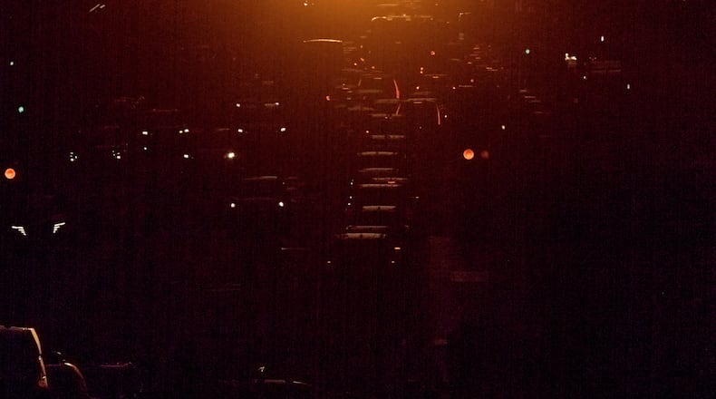 The setting sun is framed between buildings during Manhattanhenge along 42nd Street, Thursday, May 28, 2026, in New York. (AP Photo/Andres Kudacki)