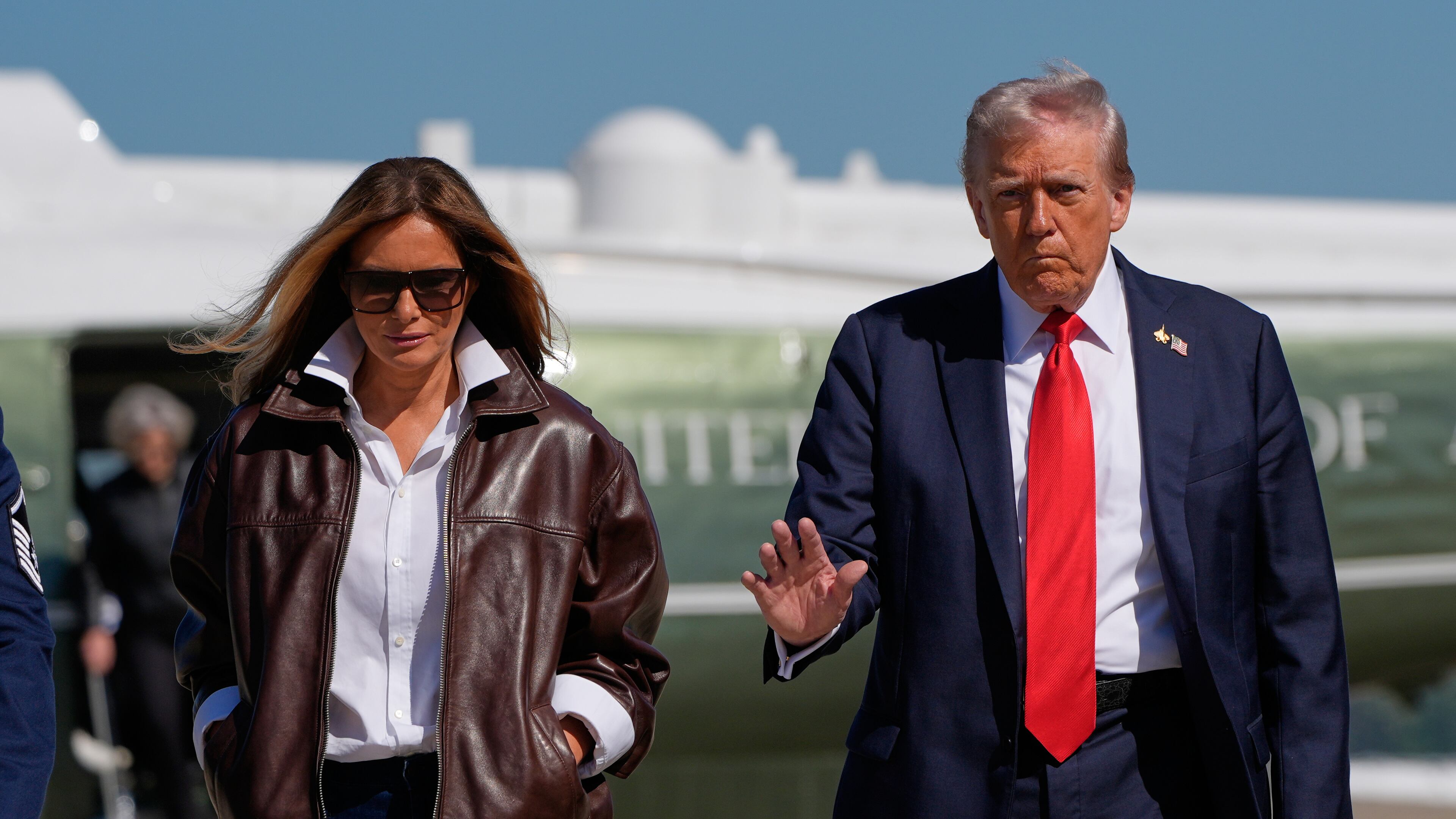 President Donald Trump and first lady Melania Trump walk from Marine One to board Air Force One, Sunday, Oct. 5, 2025, at Joint Base Andrews, Md., en route to Norfolk, Va. (AP Photo/Alex Brandon)