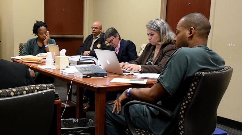 Therian Wimbush, left, and Recardo Wimbush, right, appeared in court Thursday, March 19, 2015, in an attempt to regain custody of their 10 children.
