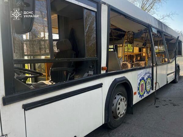 In this photo provided by the Ukrainian Emergency Service, a damaged bus that was hit by the Russian drone in Marhanets, Dnipropetrovsk region, Wednesday, April 23, 2025. (Ukrainian Emergency Service via AP)