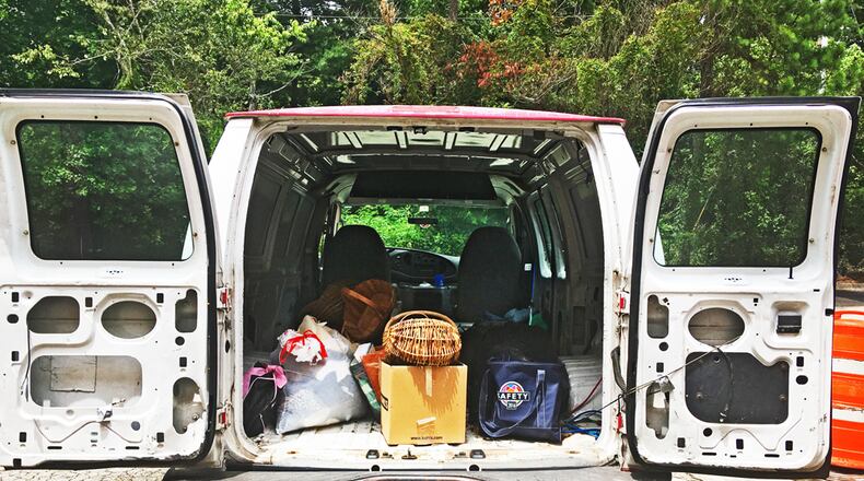 The van was stolen from the parking lot of a Furkids thrift store in Johns Creek.