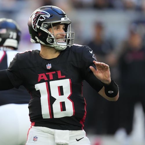 Atlanta Falcons quarterback Kirk Cousins (18) passes against the Arizona Cardinals during the first half of an NFL football game, Sunday, Dec. 21, 2025, in Glendale, Ariz. (AP Photo/Ross D. Franklin)