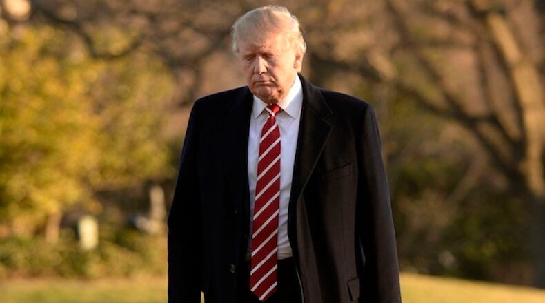 U.S. President Donald Trump walks toward the residence as he arrives at the White House on Monday, Feb. 6, 2017. (Olivier Douliery/Abaca Press/TNS)