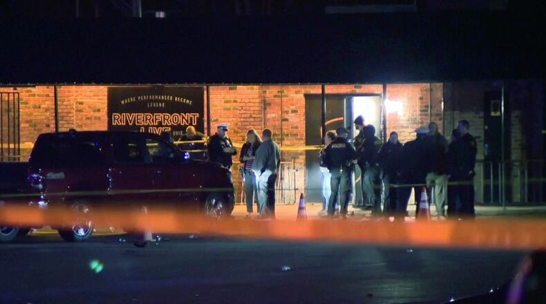 This image taken from video taken provided by WCPO shows first responders outside of Riverfront Live on Sunday, March 1, 2026, in Cincinnati, Ohio. (WCPO via AP)