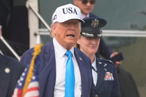 President Donald Trump walks to his vehicle after being greeted by Air Force Col. Angela F. Ochoa, Commander, 89th Airlift Wing, as he arrives on Marine One, and before he goes to look at the Joint Base Andrews golf course, Friday, June 6, 2025. (AP Photo/Manuel Balce Ceneta)
