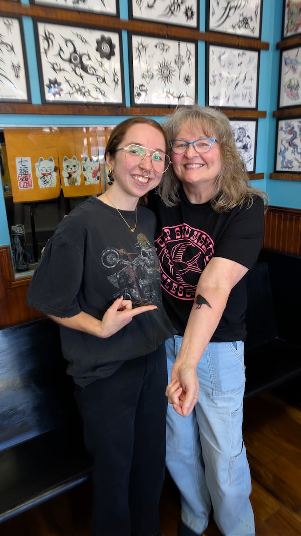 Stephanie Grooms (right) has received multiple tattoos from her daughter, Nova, at Timeless Tattoo. (Courtesy of Stephanie Grooms)