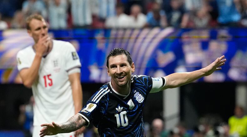 Argentina's Lionel Messi celebrates after teammate Enzo Fernandez scored their side's first goal during the World Cup semifinal soccer match between England and Argentina in Atlanta, Wednesday, July 15, 2026. (AP Photo/Rebecca Blackwell)