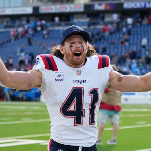 New England Patriots safety Brenden Schooler (41) celebrates following an NFL football game against the Tennessee Titans, Sunday, Oct. 19, 2025, in Nashville, Tenn. (AP Photo/George Walker IV)