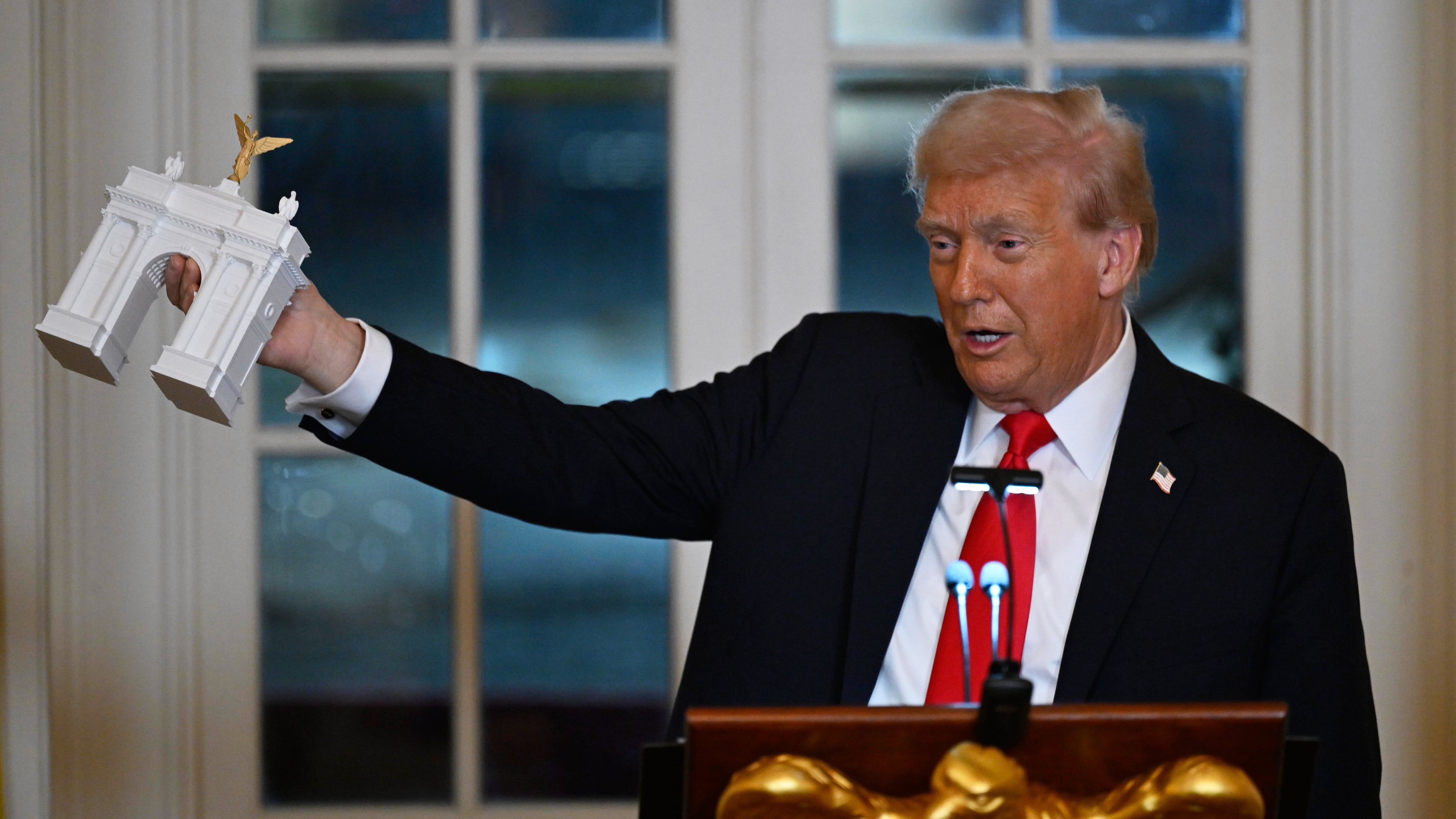 President Donald Trump addresses a dinner for donors who have contributed to build the new ballroom at the White House, Wednesday, Oct. 15, 2025, in Washington. (AP Photo/John McDonnell)