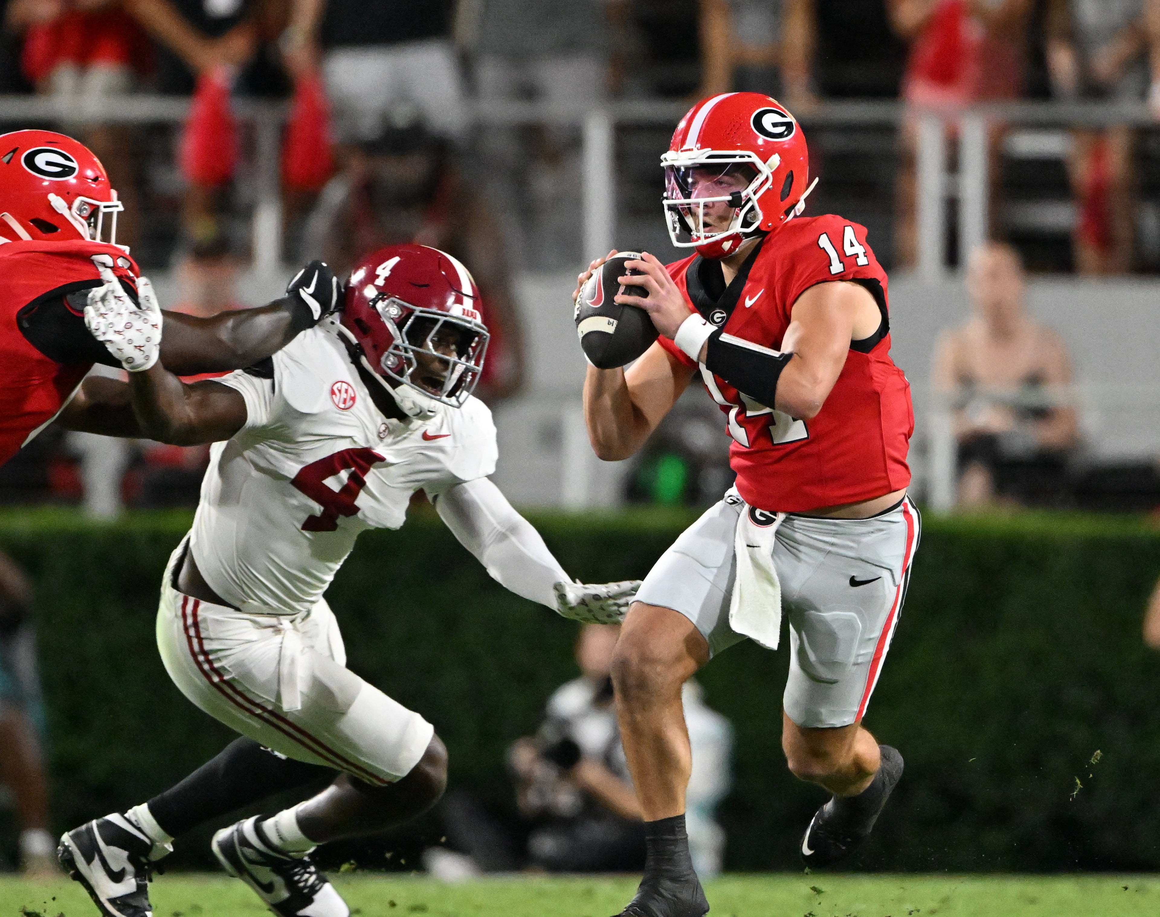 Georgia quarterback Gunner Stockton (14) prepares to get off a pass during the first half in an NCAA football game at Sanford Stadium, Saturday, September 27, 2025, in Athens. (Hyosub Shin / AJC)