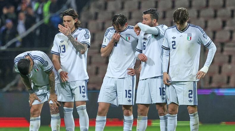Italy players react during a penalty shootout during the World Cup qualifying playoff final soccer match between Bosnia and Italy in Zenica, Bosnia, Tuesday, March 31, 2026. (AP Photo/Armin Durgut)