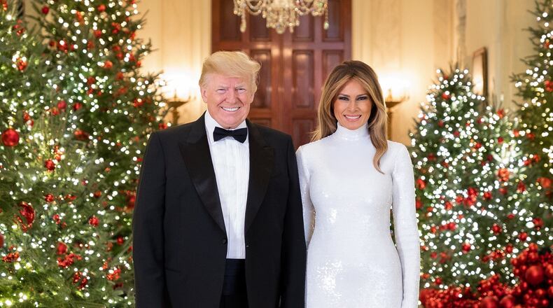 Washington, D.C. President Donald J. Trump and First Lady Melania Trump are seen in their Official Christmas Portrait in the Cross Hall of the White House.