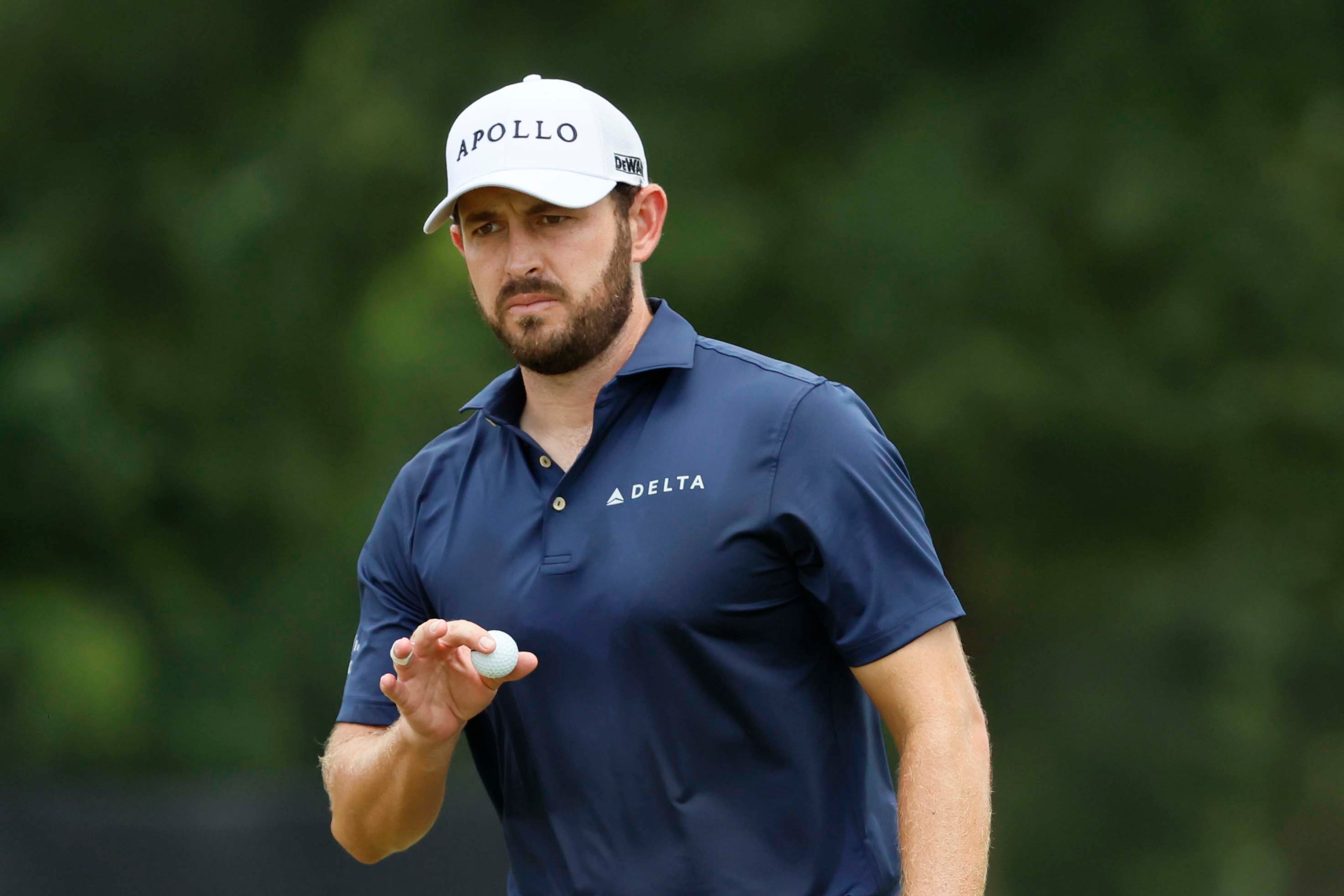 Patrick Cantlay reacts with the fans after his putt on the third hole during the final round of the PGA Tour Championship at East Lake Golf Club, on Sunday, Aug. 24, 2025, in Atlanta. (Miguel Martinez/ AJC)