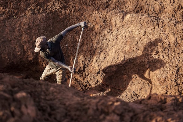 A gold miner works in Senegal's Kedougou region Thursday, Jan. 16, 2025. (AP Photo/Annika Hammerschlag)