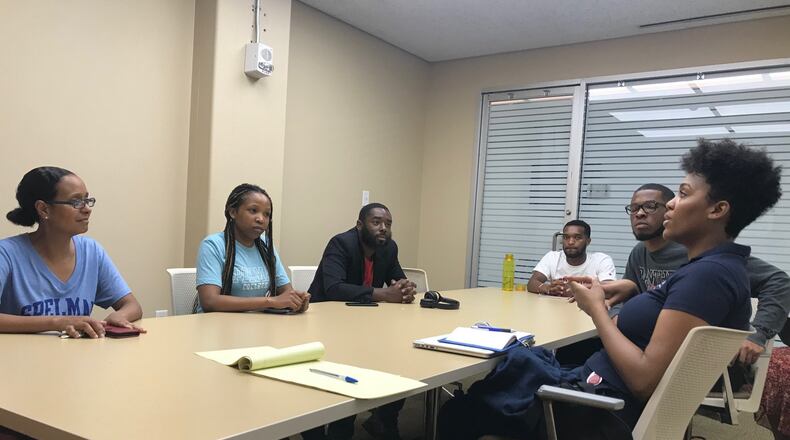 Morehouse School of Medicine student Kaylin Carey (right) discusses how data science software can help with her research. UnitedHealth Group is investing $8.25 million over five years into data science education at that school and other Atlanta University Center Consortium campuses. ERIC STIRGUS / ESTIRGUS@AJC.COM.
