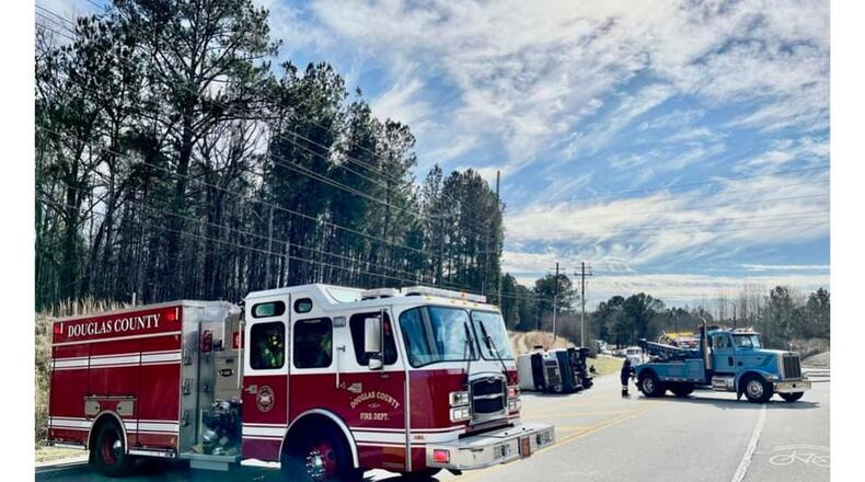 Firefighters and other emergency crews responded to a hazmat situation along Riverside Parkway on Wednesday afternoon. Authorities responded after a tractor-trailer overturned. (Credit: Douglas County Fire/EMS Department)