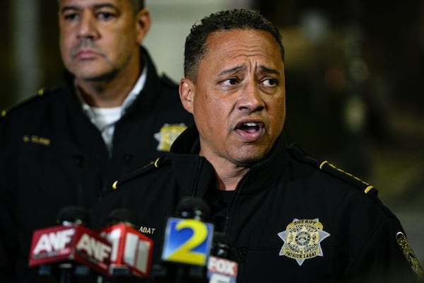 Fulton County Sheriff Pat Labat speaks to reporters after an inmate allegedly set a fire inside the jail Friday evening. (Ben Hendren for the AJC)