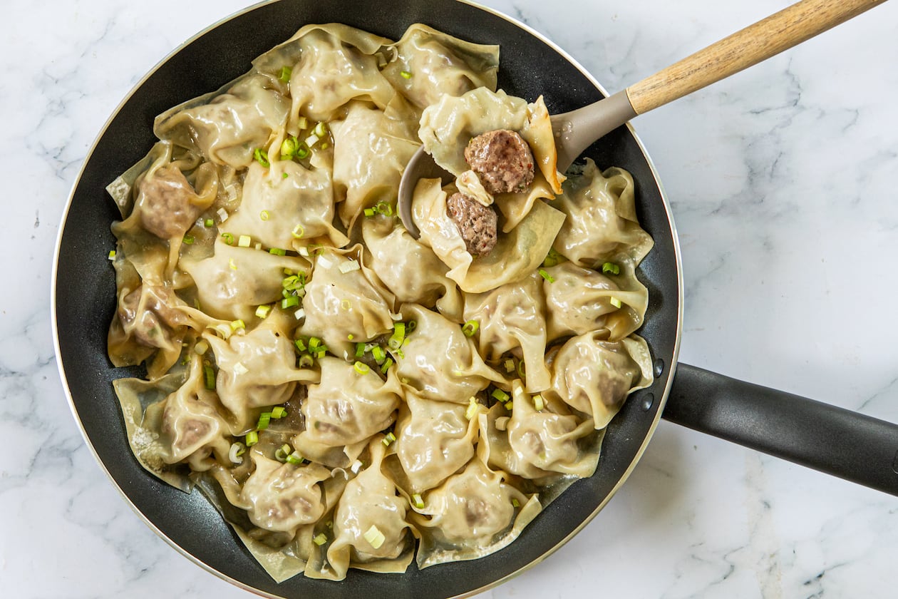 Blanket dumplings are what they sound like: a ball of filling blanketed, rather than encased, in a wrapper. (Aaliyah Man for the AJC; food styling by Kate Williams)